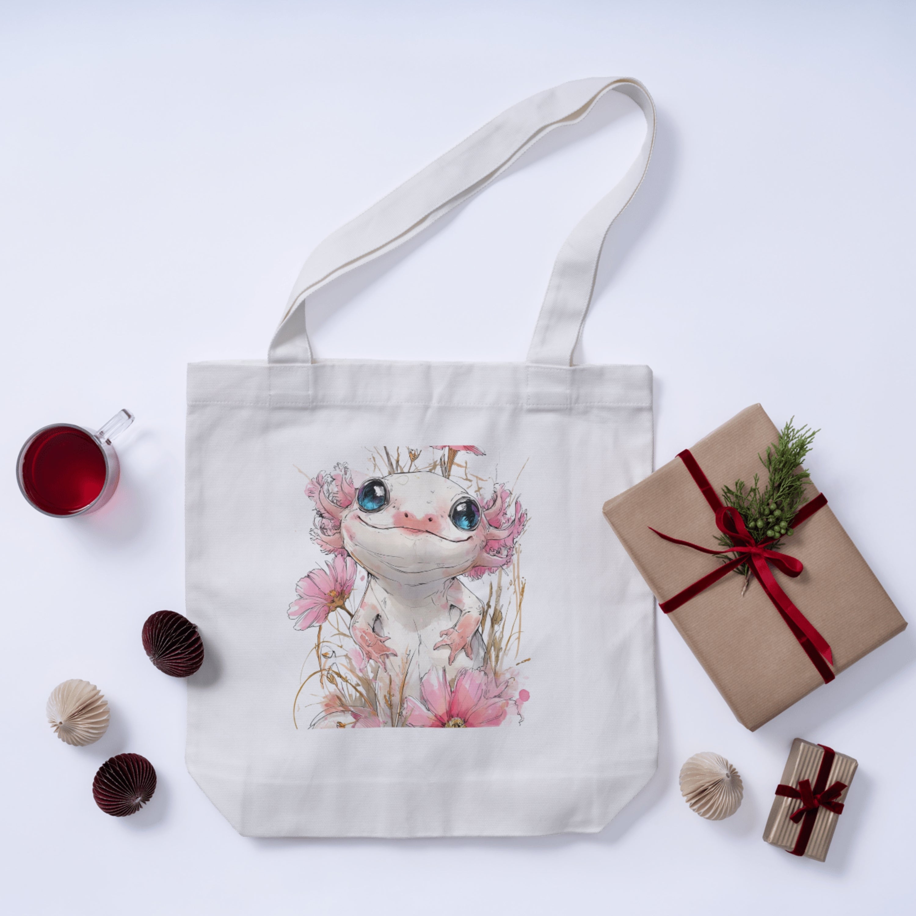 Tote bag with a cute animal design surrounded by decorative items on a white background